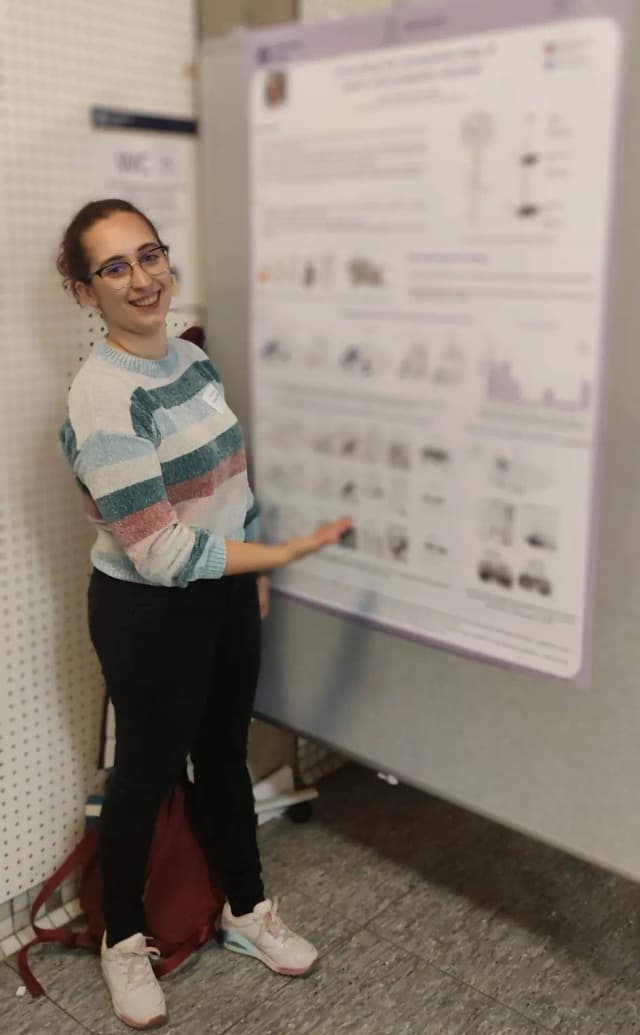 Sandrina presenting a scientific poster at Neuroscience day in Cologne